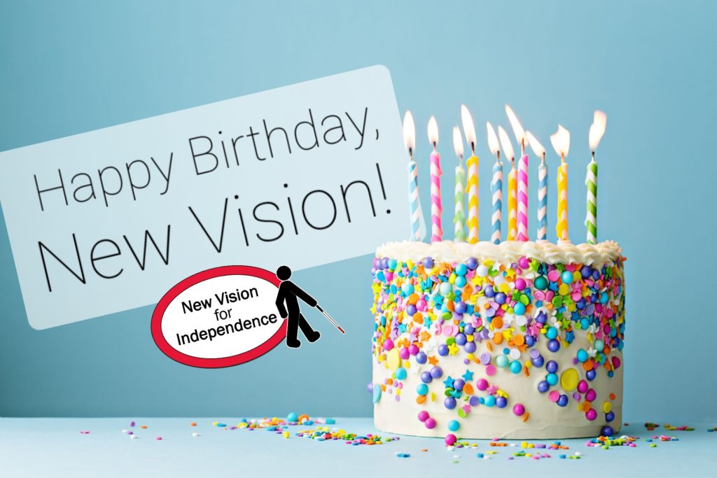 birthday cake with text "Happy Birthday, New Vision!"
